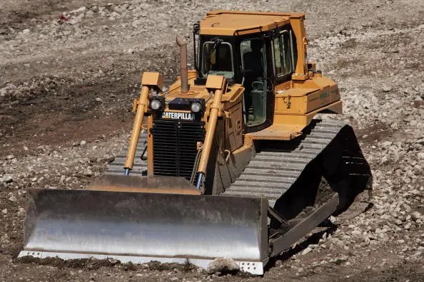 Caterpillar Posts Sharply Lower Profit